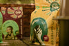 A packaged bag of Haiti Coffee's Sanctuary Haitian coffee with branding and design details visible.